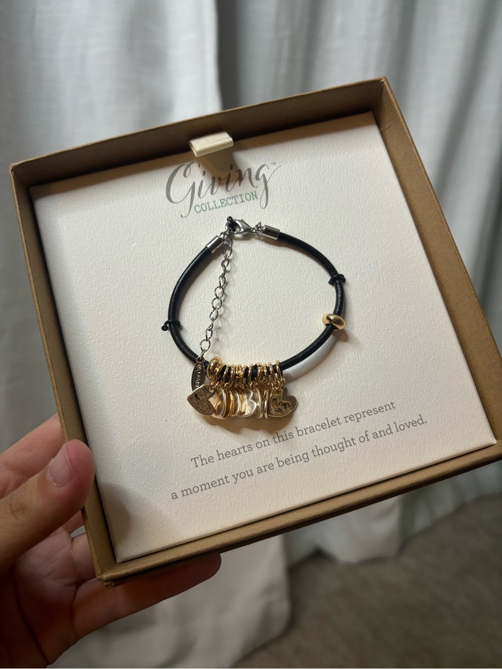Demdaco Black and Gold Heart Charm Bracelet